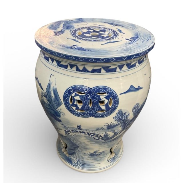 This elegant Chinese-style porcelain garden stool features a timeless blue and white palette, making it a sophisticated...