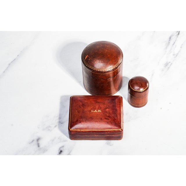 A delightful trio of handcrafted Italian leather boxes dating to the 1950s, this elegant set embodies the refinement and...
