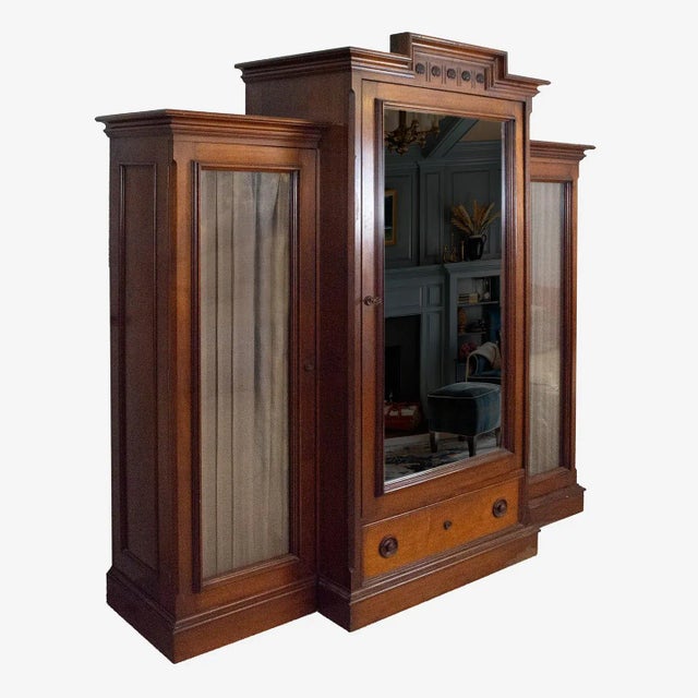 Offering a stunning antique wardrobe with solid joints and hand-cut dovetail work, dating to the late Victorian period,...