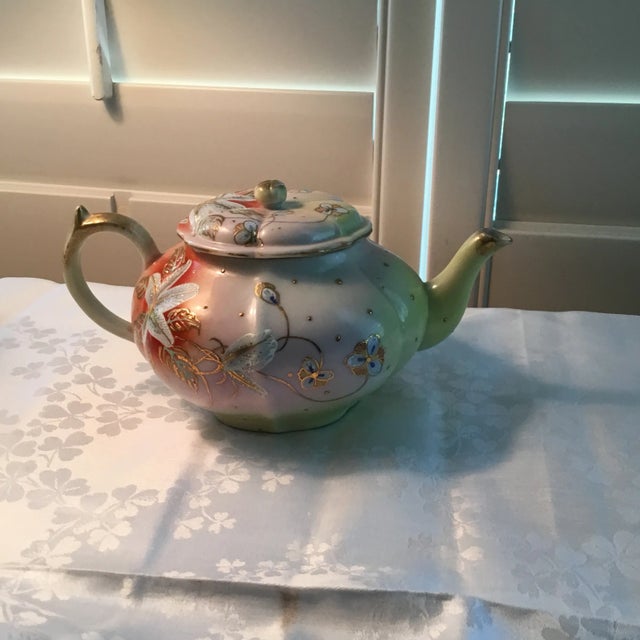 Antique Japanese tea pot. Probably from 1980’s 2 cups. Relief Hand Painted Flowers. Porcelain.