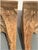 A beautifully carved pair of vintage wood corbels, featuring classic architectural detailing and a rich, time-worn patina....