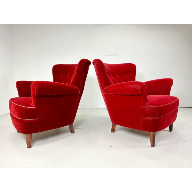 1940’s Red Velvet Danish Lounge Chairs. Birch legs. More recently upholstered.
