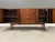 A mid century modern walnut sideboard credenza designed by Kipp Stewart and Stewart MacDougall for Drexel’s Declaration...
