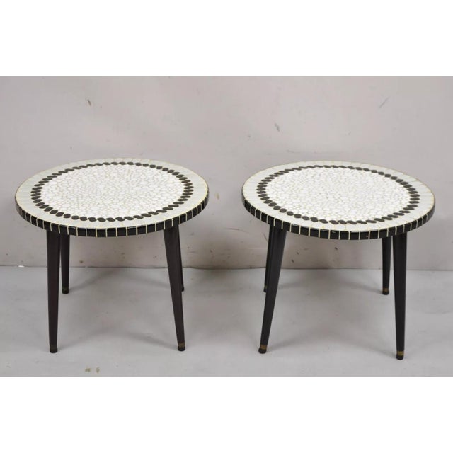 Vintage Mid Century Modern Mosaic Tile Top Round Low Side Tables - a Pair. Item features gray, black, and white ceramic...