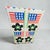 Vintage Nigerian Yoruba style hand-beaded armchair featuring American flags, floral motifs, and geometric designs....