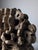 This large-format sculpture in glazed stoneware stands out for its remarkable visual impact, balancing a powerful...