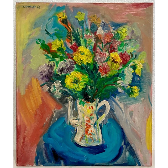 This is a bright, colorful modernist oil painting of a vase of Flowers A great floral work. George Chemeche was born in...