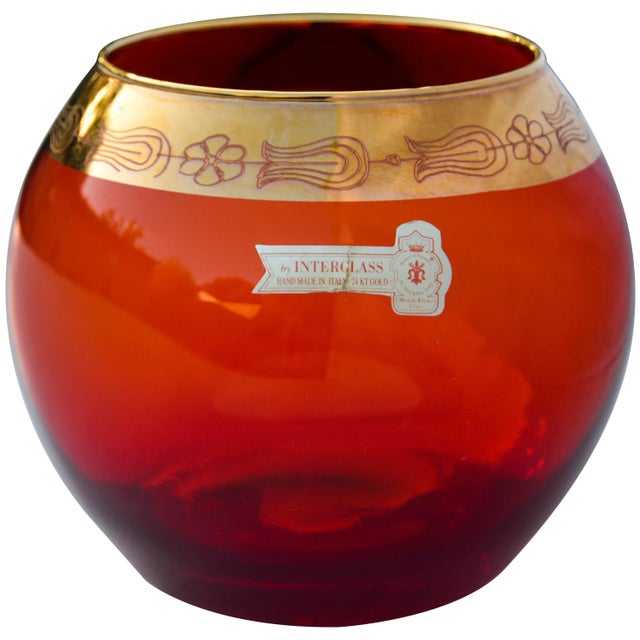 Midcentury handmade red glass centerpiece and candleholder, elegantly detailed with fine gold rim and motif. Marked:...