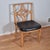 This is a vintage Chinese chippendale style rattan side chair that can be used as an accent chair or as a desk chair. The...