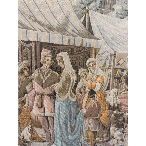 This is a beautiful, high-quality vintage French tapestry that vividly depicts a bustling medieval street market scene set...