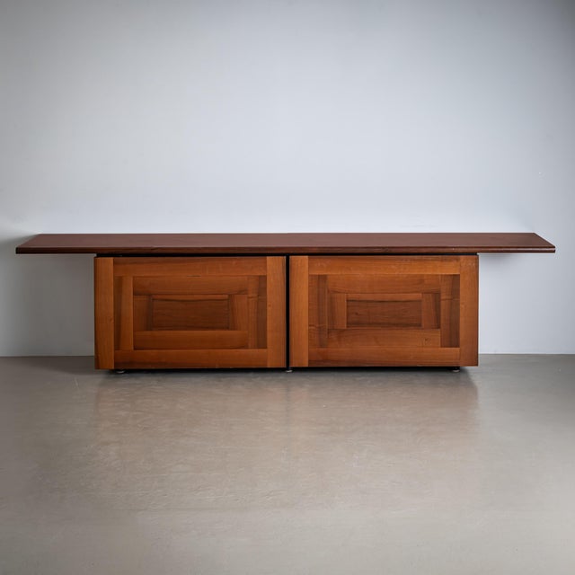 Long Sideboard with two doors and an extended top, designed in 1977 by Giotto Stoppino and Lodovico Acerbis and produced...