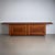 Long Sideboard with two doors and an extended top, designed in 1977 by Giotto Stoppino and Lodovico Acerbis and produced...