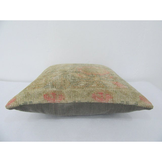 This is a pillow cover made from a vintage kilim rug. The piece was properly washed and ready to use. Pillow inserts not...