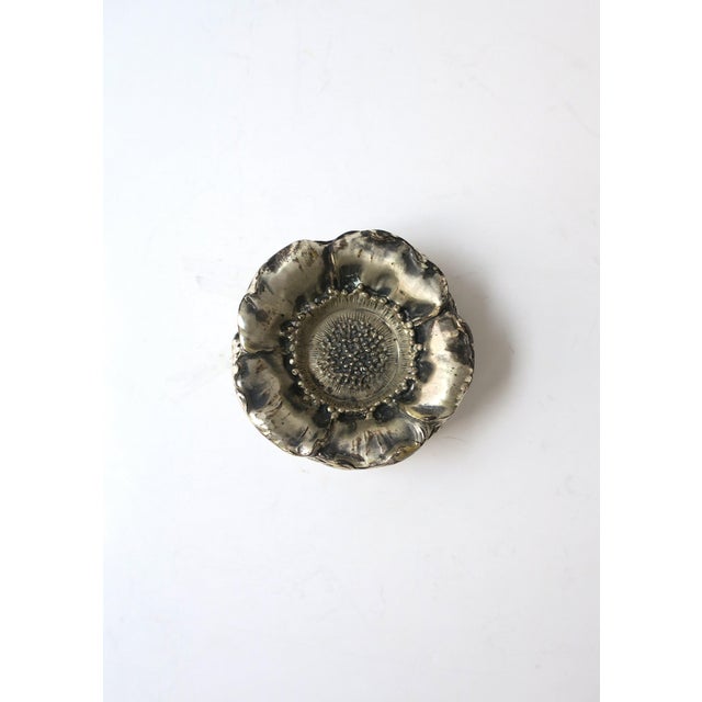 A beautiful set of five (5) Italian sterling silver flower‑form bowls, Organic Modern style, circa late‑20th century,...