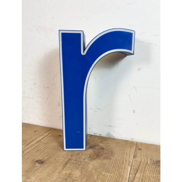This vintage industrial blue plastic illuminated letter “ r “ was made in Italy during the 1970s and comes from an old...