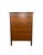 A handsome antique oak tall chest dating to the early decades of the 20th century, this five-drawer piece combines...