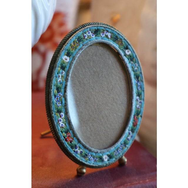 A jewel-like Italian miniature picture frame with an intricate floral glass mosaic, vivid turquoise borders, and delicate...