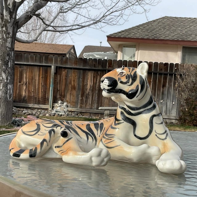 This is a beautiful porcelain “Lying Tiger” by the Lomonosov Porcelain Factory in Russia. They did an excellent job...