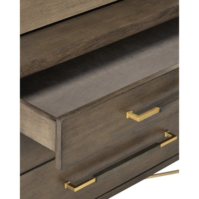 The Verona Chanterelle Secretary Desk is darkly handsome covered in a chanterelle finish with metal detailing in a...