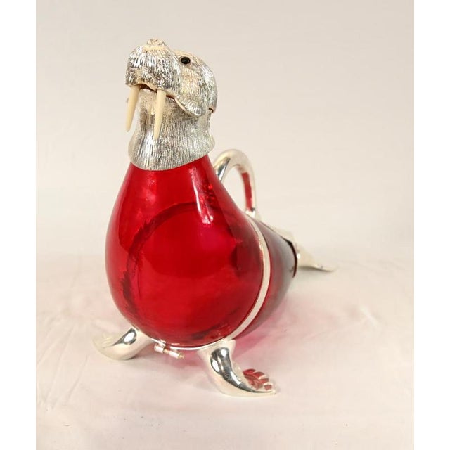 Wow - does not get any more quirky than this - a silver plate decanter in the form of a walrus i am the walrus, goo-goo...