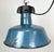 Industrial blue enamel pendant light made by Polam Wilkasy in Poland during the 1960s. White enamel inside the shade. Cast...