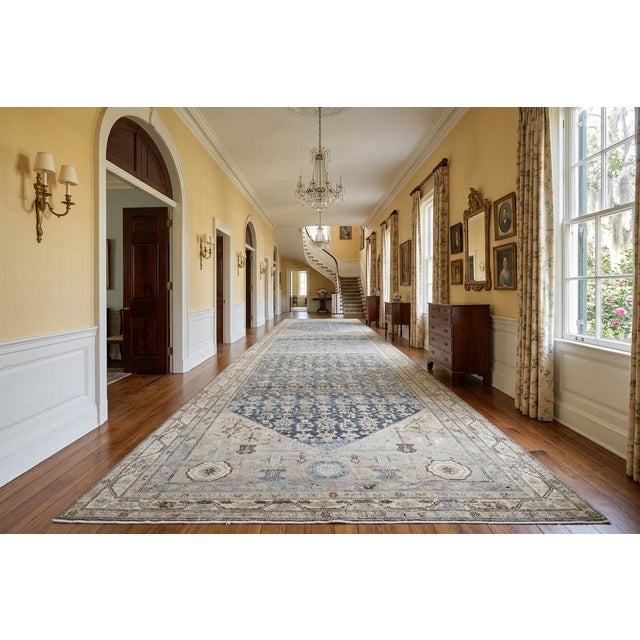 An early 20th Century Persian Malayer blue and cream corridor rug