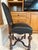 This refined Theodore Alexander Spanish Colonial–style side chair effortlessly blends old-world craftsmanship with...