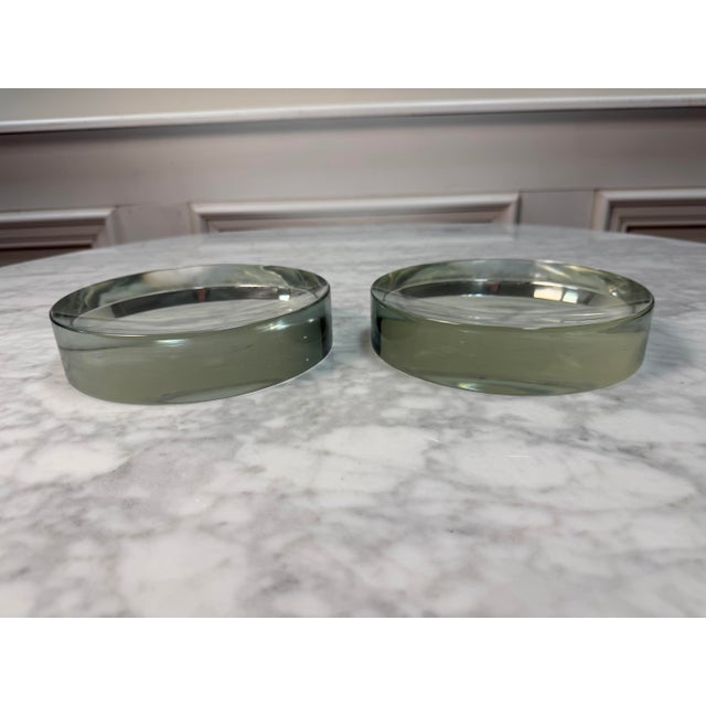 Iconic Minimalist Design Elevate your space with this stunning, authentic pair of heavy clear glass "vide-poche" (catch-...