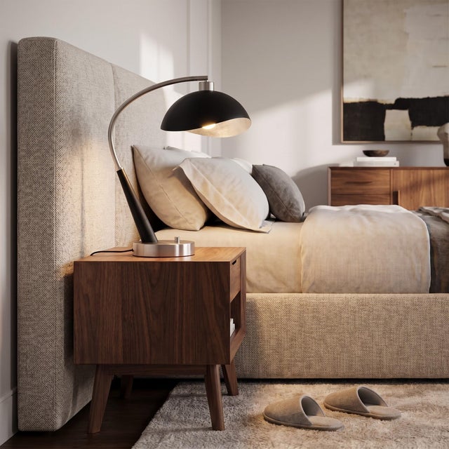 The Luna Bella Boomerang Table Lamp is a striking addition to NOVA's lighting collection, featuring a sleek black oak and...