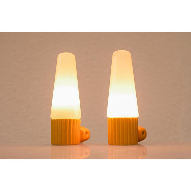 A beautifully preserved pair of mid-century wall sconces designed by hans-agne jakobsson for the iconic swedish lighting...