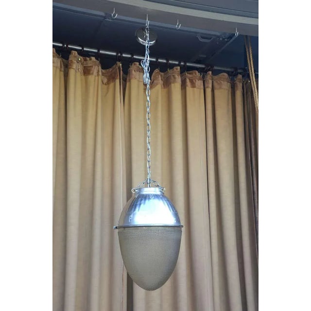 Beautiful 1930’s - 1950's hanging Pendant street light. Restored for interior use this unit would have adorned an...
