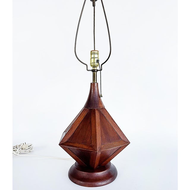 Mid-Century Modern Wooden Modernist Table Lamps, Pair Offered for sale is a vintage pair of mid-century modern wooden...