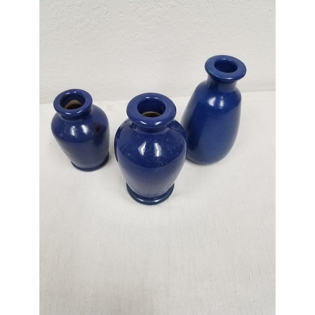 Beautiful set of three cobalt blue glazed heavy stoneware pots - originally a furniture polish pot by Ronuk Polish based...