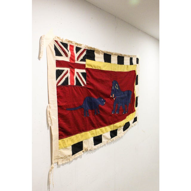A bold original Asafo flag, handmade by Fante artisans on the Ghanaian coast and selected for its confident, graphic...