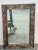 Vintage Carved Wooden frame. The carving features a floral design. Measures 24” x 36”. The mirror has a 4” boarder. This...