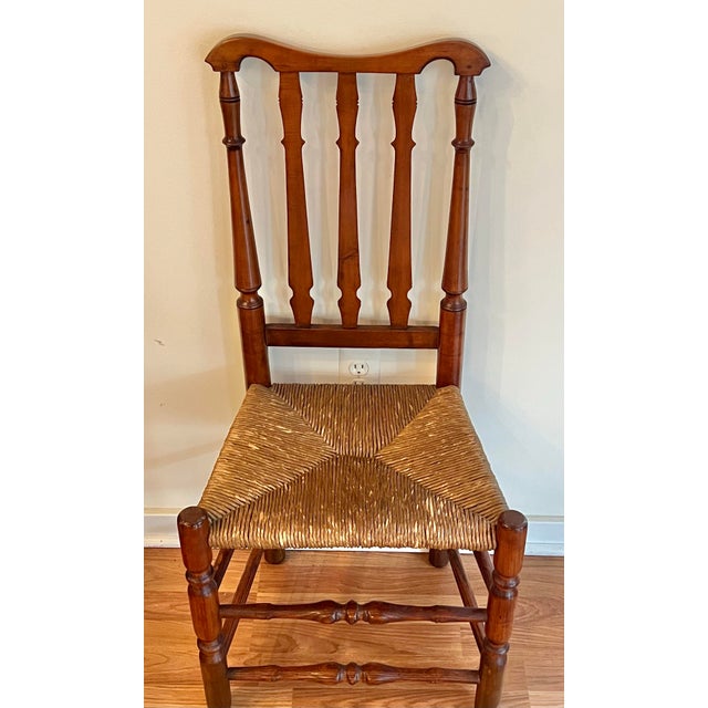 Antique 18th century William and Mary period bannister back chair. Crafted in maple and hickory with pegged construction....