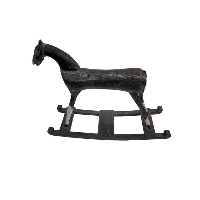 This authentic antique folk art rocking horse dates to the late 19th to early 20th century (circa 1880–1920) and embodies...