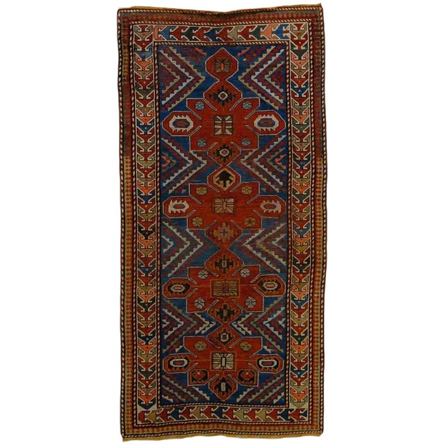 Kazakh Blue and Red Woolen Rug, 1920s For Sale