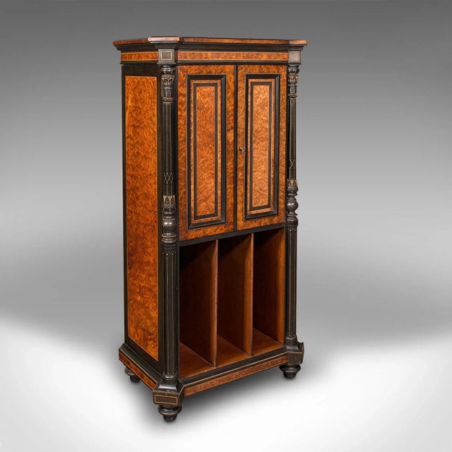 This is an antique gentleman's folio cabinet. An English, bird's eye maple and burr walnut decorative cupboard, dating to...