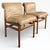 A stylish pair of mid-century chairs by White & Newton, designed by Philip Hussey, showcasing clean-lined teak frames...