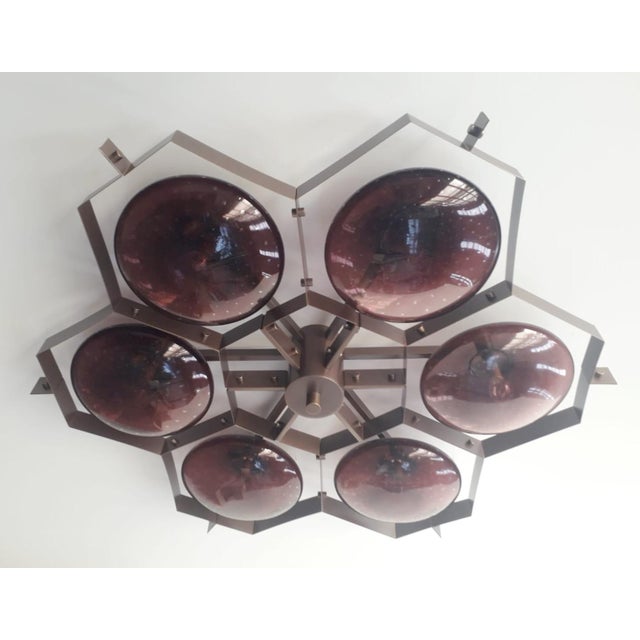 Italian midcentury flush mount with six amethyst Murano glass shades carefully hand blown with bubbles inside the glass...