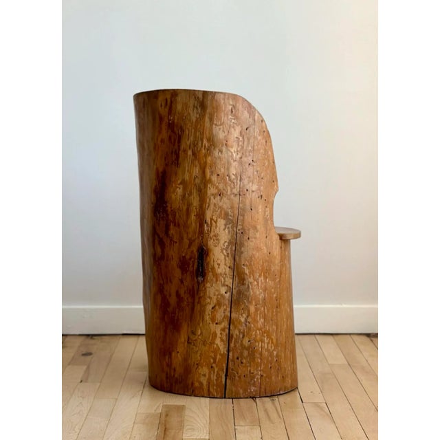 A traditional Scandinavian 'Kubbestol' or trunk chair. Hewn from a single log, with a hollow center that can be used for...