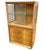 Original Birch curio cabinet and drawers with bronze scrolling drawer pull feature a sleek cubist mid-century design...