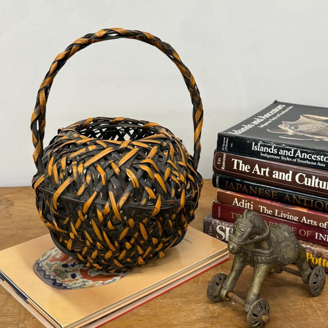 Rustic Small Round Orange and Black Basket with Curved Handle For Sale - Image 3 of 9