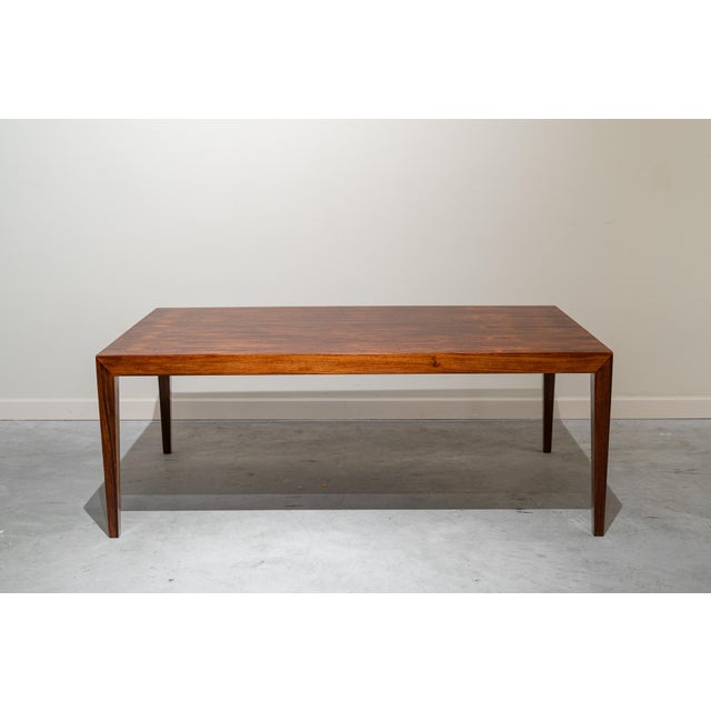 Coffee table designed by Severin Hansen in the 1960s. The table consists of a rectangular tabletop and four rectangular...