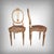 These chairs embody the timeless elegance of the Louis XVI style, enhanced by refined gilding. Their delicately carved...