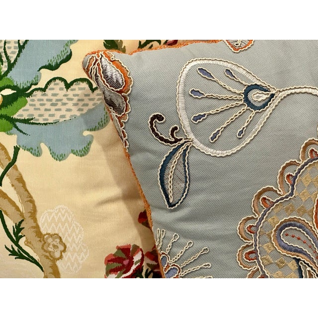 A refined pair of custom decorative throw pillows crafted from iconic English and French textile house fabrics, offering a...
