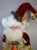 A whimsical vintage Mark Roberts Christmas fairy, circa 2000s, dressed in rich red, chartreuse and gold velvet with...