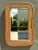 This stunning large wall mirror is a masterpiece of 1970s Organic Modernism, bearing the prestigious Gabriella Crespi...