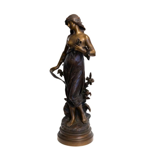A 19th-century tabletop bronze sculpture of the Roman goddess of the hunt, Diana, captured mid-motion by the celebrated...